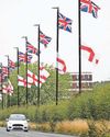 Workers being hired to take down flags in city4