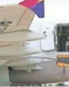 12 hurt as passenger opens emergency door mid-flight