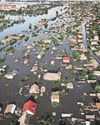 Thousands flee as floods rise in Ukraine after dam destroyed