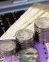 Rupee falls 11 paise to a new low of 84.91/dollar