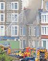 Murder inquiry after hotel blaze0