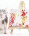 Little Paw-cassos show off their artwork Little Paw-cassos show off their artwork