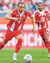 Kane supplies bullets to keep Bayern firing86