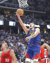 Nuggets rout Clippers to advance Nuggets rout Clippers to advance
