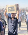 Thousands storm UN aid warehouse23