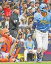 Brewers prevail with game-ending out at plate24