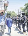 Tear gas fired as protests enter second day22