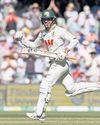 Emotional Carey puts Aussies on top Emotional Carey puts Aussies on top38