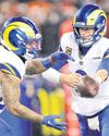 Stafford steers Rams through snow, chaos30