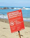 Mayor swims to allay fears of waste leak26