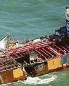 Under arrest cargo ship crash captain identified as a Russian national