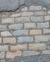 Stone me! Time warp Victorian cobbled street revealed under large pothole Stone me! Time warp Victorian cobbled street revealed under large pothole