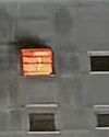 Teen arrested after fire at flats Teen arrested after fire at flats36