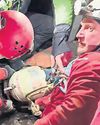 Injured caver lifted out after four days stuck underground