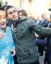 'Part of history' Syrian refugee behind viral Merkel selfie plans to help rebuild war-torn nation