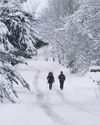 At least 17 people rescued in flooding as snow-hit UK has 'miserable Monday'