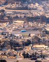 Lost to the flames Family homes in a thriving enclave reduced to ashes