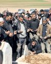 Entire families killed' as Syrian forces clash with Assad loyalists