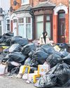 Rubbish piles up in Birmingham as bin workers launch strike