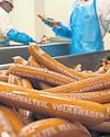 Wurstening profits: downturn at VW brightened by sausage sales