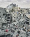 Israeli air attack on block of flats in Gaza kills 23 people38