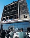 Scores killed in fire at new shopping centre in Iraq The Guardian