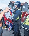 Police Arrest Two After Protest at Asylum Hotel Turns Violent The Guardian