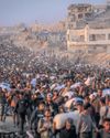 Eleven-minute race for food How Gaza aid points became 'death traps' The Guardian