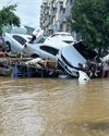 Thirty killed and 80,000 evacuated as flooding hits Beijing32