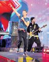 Music review A slick sugar rush of overwhelming stadium rock22