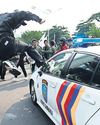 Death of man hit by police vehicle leads to protests in Jakarta The Guardian
