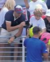 'A grave mistake': millionaire sorry for snatching cap from young tennis fan The Guardian