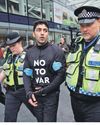 Man removed from King's Cross clock tower after Iran protest The Guardian
