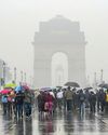 DELHI SHIVERS AS TEMP DROPS, MORE RAIN WOES AHEAD