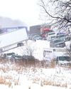 100 vehicles pile up in Michigan crash as snowstorm sweeps US55