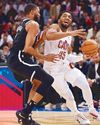 DONOVAN LIGHTS UP PARIS CAVS CLIP NETS IN OVERSEAS GAME8