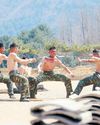 NoKor's Kim fires new sniper rifle while visiting troops NoKor's Kim fires new sniper rifle while visiting troops