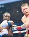 Crawford Stuns Alvarez Before 70,482 Fans Crawford Stuns Alvarez Before 70,482 Fans49
