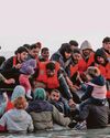 Migrants haul children aboard as ‘1,000 make crossing’ Migrants haul children aboard as ‘1,000 make crossing’17