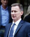 Hunt says he'll look at tax in bid to quiet Tory dissenters5
