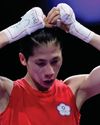 Lin wins first boxing bout as gender controversy rages