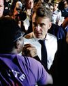 Macron swears in heated exchanges with crowds in cyclone-battered Mayotte