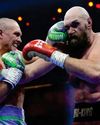 Usyk outpoints Fury again to retain heavyweight titles