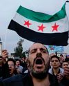 Protests in Syria erupt after Christmas tree set on fire