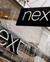 Next posts rise in sales but warns of difficult year ahead