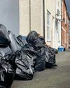 Bin strike health hazard as rats ‘feast' on rotting trash