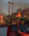 Wildfire forces thousands of tourists to evacuate Crete11