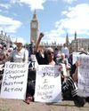 Holding up a placard should not be a criminal offence12