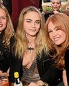 The King and Sir David Attenborough reign over the blue carpet... with a little help from the Delevingnes5