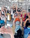 Mumbai commuters stretch, find calm in chaos27